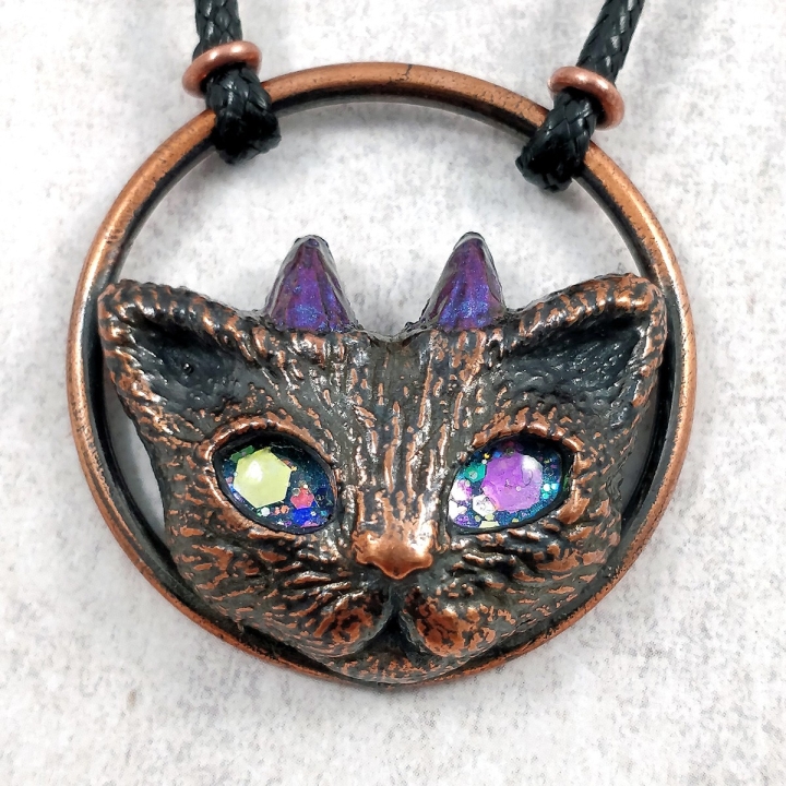 bijou cuivre chat démon cornes cercle yeux étoiles