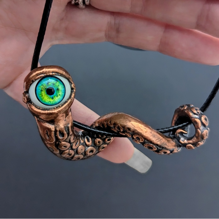 tentacule alien oeil vert