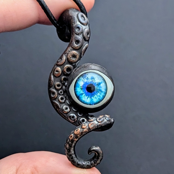 Tentacule alien oeil bleu