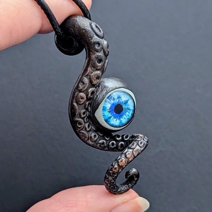 Tentacule alien oeil bleu