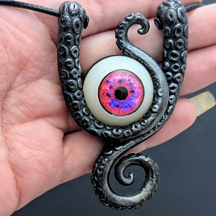 Double Tentacule alien oeil rouge bleu