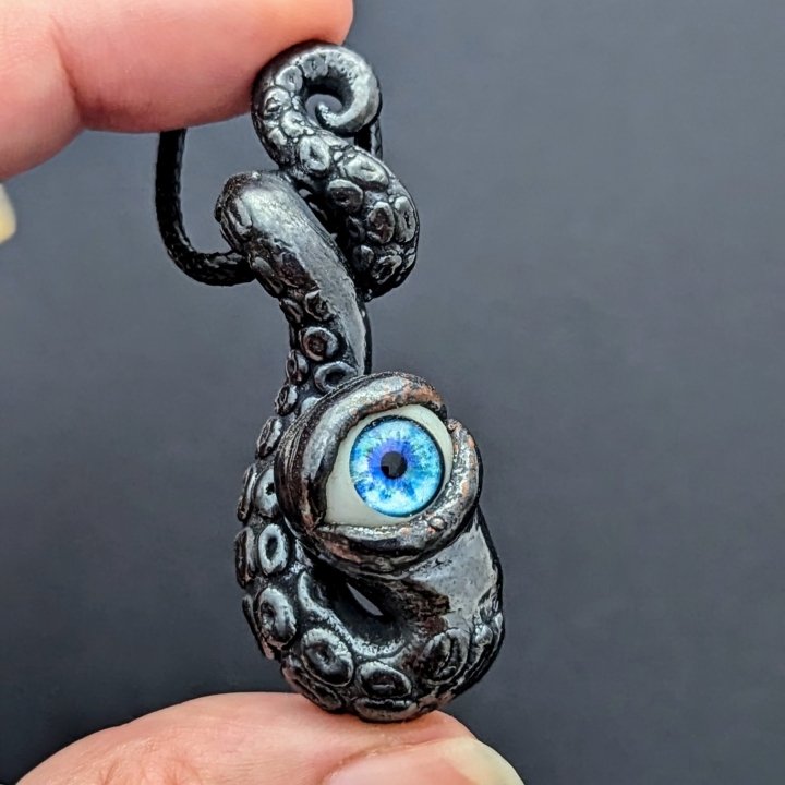 Tentacule alien oeil bleu